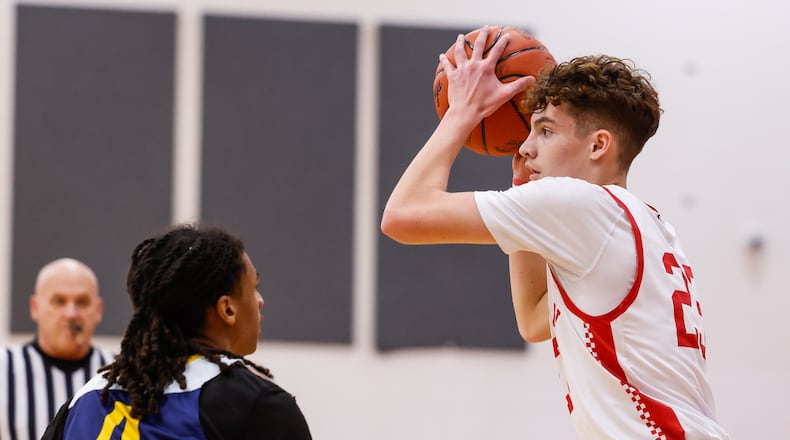 Madison's Hayden Werts looks to pass during their basketball game Friday, Dec. 26, 2025 at the Brian Cook Classic basketball tournament at Madison High School. Madison defeated Lockland 65-40. NICK GRAHAM/STAFF