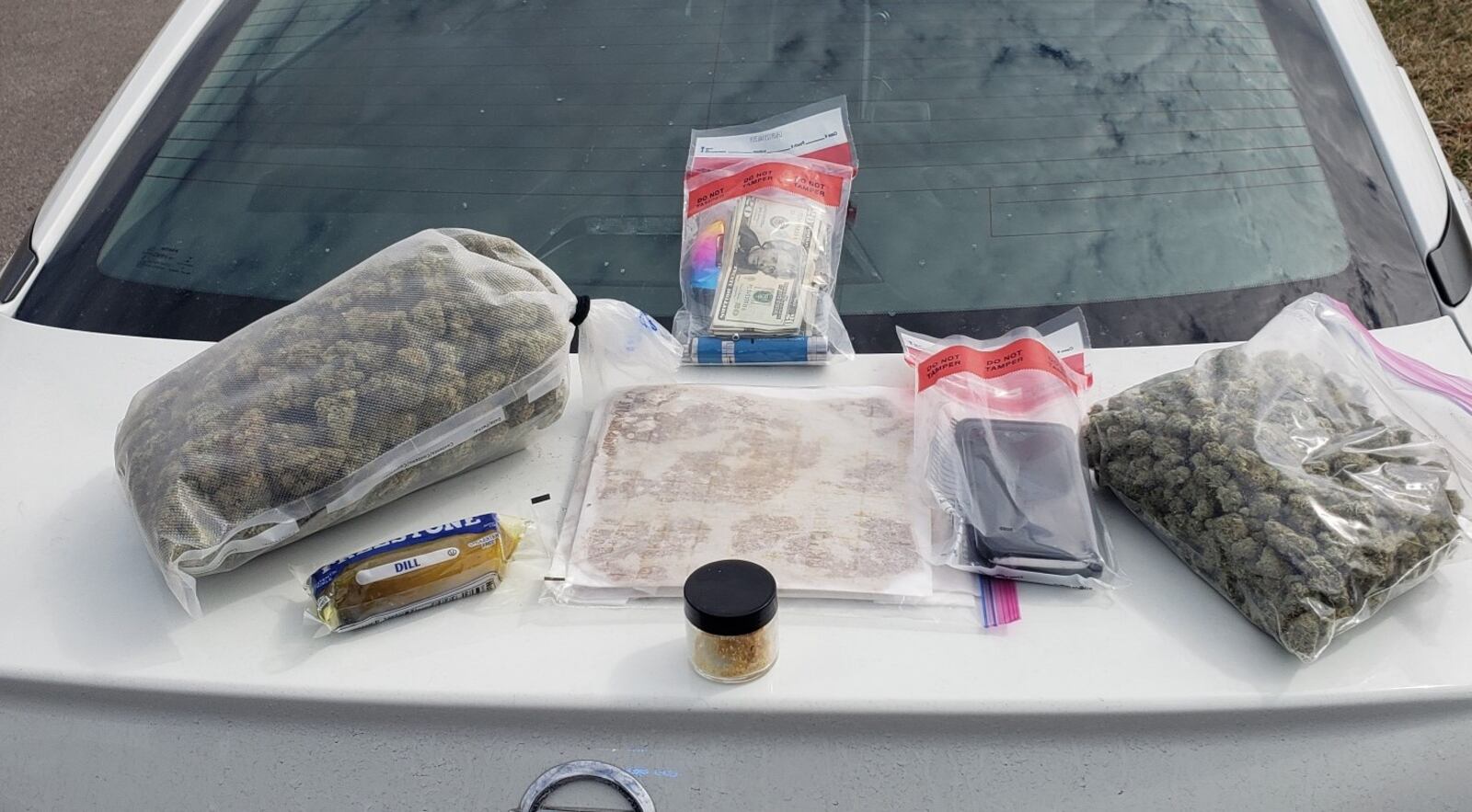 The Butler County Sheriff's Office B.U.R.N. taskforce found marijuana and a large amount of a wax substance along with cash and a pickle when they pulled a man over on I-75. Photo: BCSO