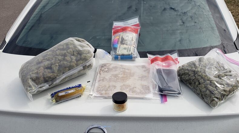 The Butler County Sheriff's Office B.U.R.N. taskforce found marijuana and a large amount of a wax substance along with cash and a pickle when they pulled a man over on I-75. Photo: BCSO