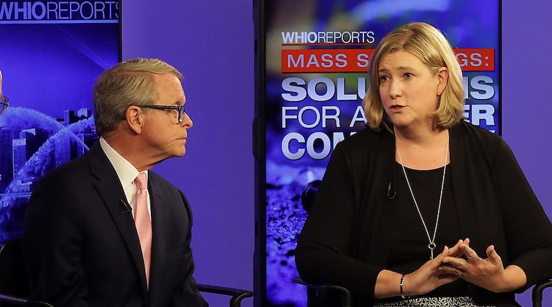 Ohio Gov. Mike DeWine and Dayton Mayor Nan Whaley received the most campaign contributions in the race for Ohio governor during the first half of 2021. In this 2019 file photo DeWine and Whaley participate in a forum about gun violence in the wake of the Aug. 4 mass shooting in Dayton's Oregon District.. BILL LACKEY/STAFF