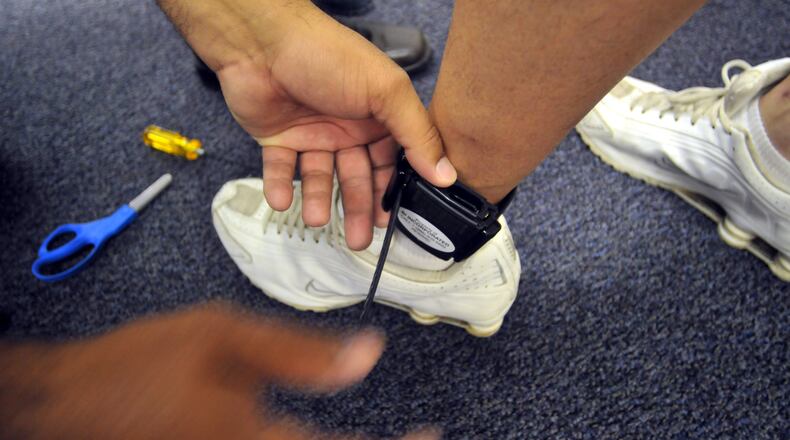 Putting more convicted criminals on GPS ankle monitoring systems will help ease the Butler County Jail population and save money, according to Sheriff Richard Jones, who said judges are on board with the idea. STAFF FILE PHOTO