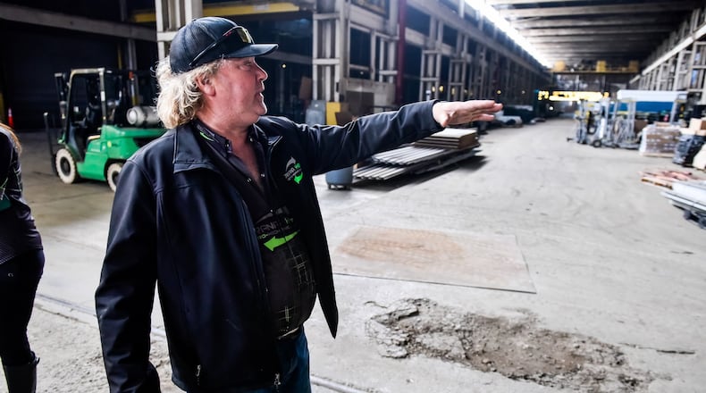 Darryl Cuttell, CEO of Darana Hybrid electro-mechanical solutions, gives a tour of the facility Wednesday, May 13, 2020 on Belle Avenue in Hamilton. The company has been working on updating the building since they bought it. Darana Hybrid installs conveyor systems for a variety of industries around the country and beyond. NICK GRAHAM / STAFF