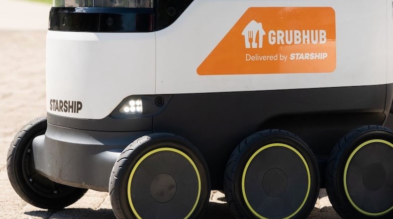 Starship robots like this one deliver food ordered through GrubHub on the Miami University campus in Oxford. CONTRIBUTED