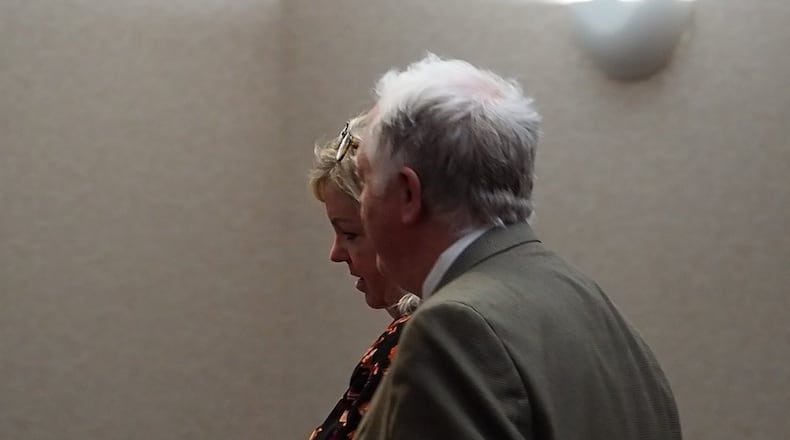 Patricia Kelly Bietenduvel and her attorney Christopher T. Travis walking out of her sentencing hearing on May 1. BRYN DIPPOLD/STAFF.