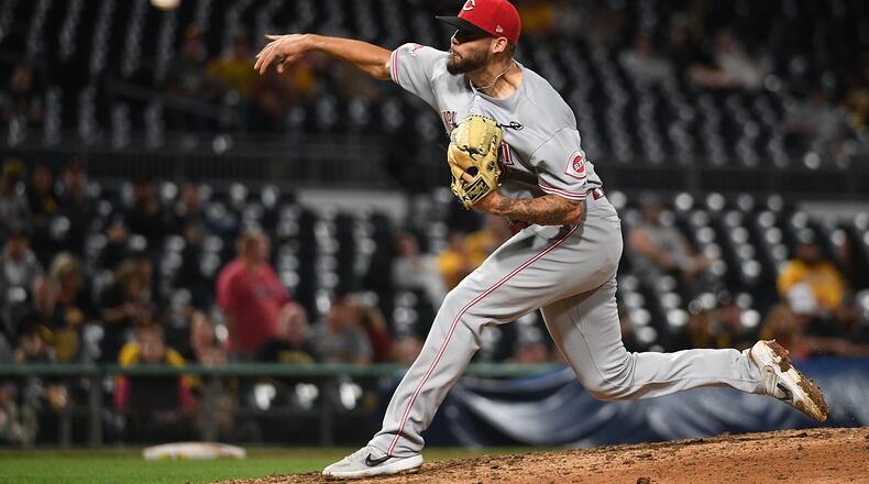 PITTSBURGH, PA - SEPTEMBER 28: R.J. Alaniz #32 of the Cincinnati Reds delivers a pitch in the twelfth inning during the game against the Pittsburgh Pirates at PNC Park on September 28, 2019 in Pittsburgh, Pennsylvania. (Photo by Justin Berl/Getty Images)