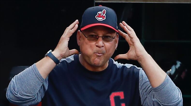 CLEVELAND, OH - JULY 09: Manager Terry Francona #77 of the Cleveland Indians requests a review of a play against the Cincinnati Reds during the third inning at Progressive Field on July 9, 2018 in Cleveland, Ohio. The Reds defeated the Indians 7-5. (Photo by Ron Schwane/Getty Images)