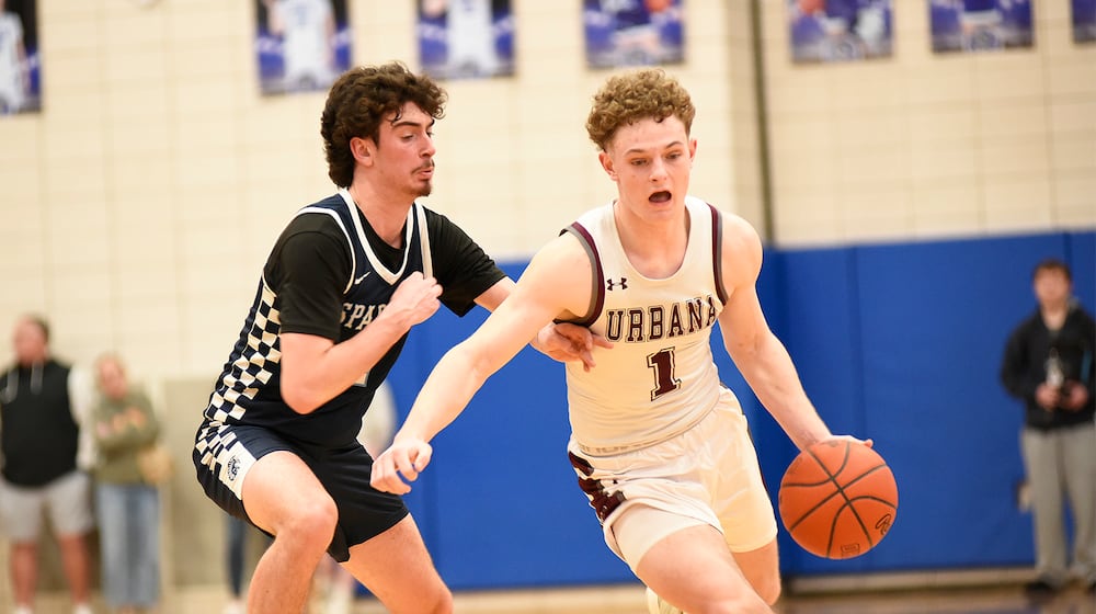 Urbana junior Grady Lantz is guarded by Valley View junior Brody Denny during their Division IV second round game on Saturday, Feb. 28 at Xenia High School. The Hillclimbers won 80-57. GEOFF NEVILLE / CONTRIBUTED PHOTO