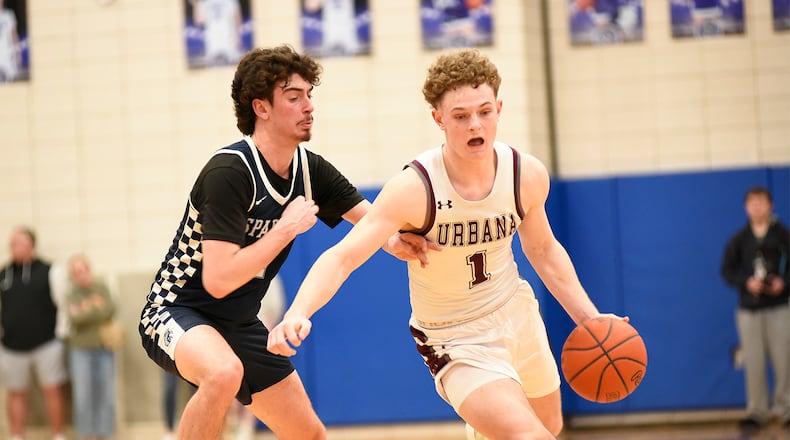 Urbana junior Grady Lantz is guarded by Valley View junior Brody Denny during their Division IV second round game on Saturday, Feb. 28 at Xenia High School. The Hillclimbers won 80-57. GEOFF NEVILLE / CONTRIBUTED PHOTO