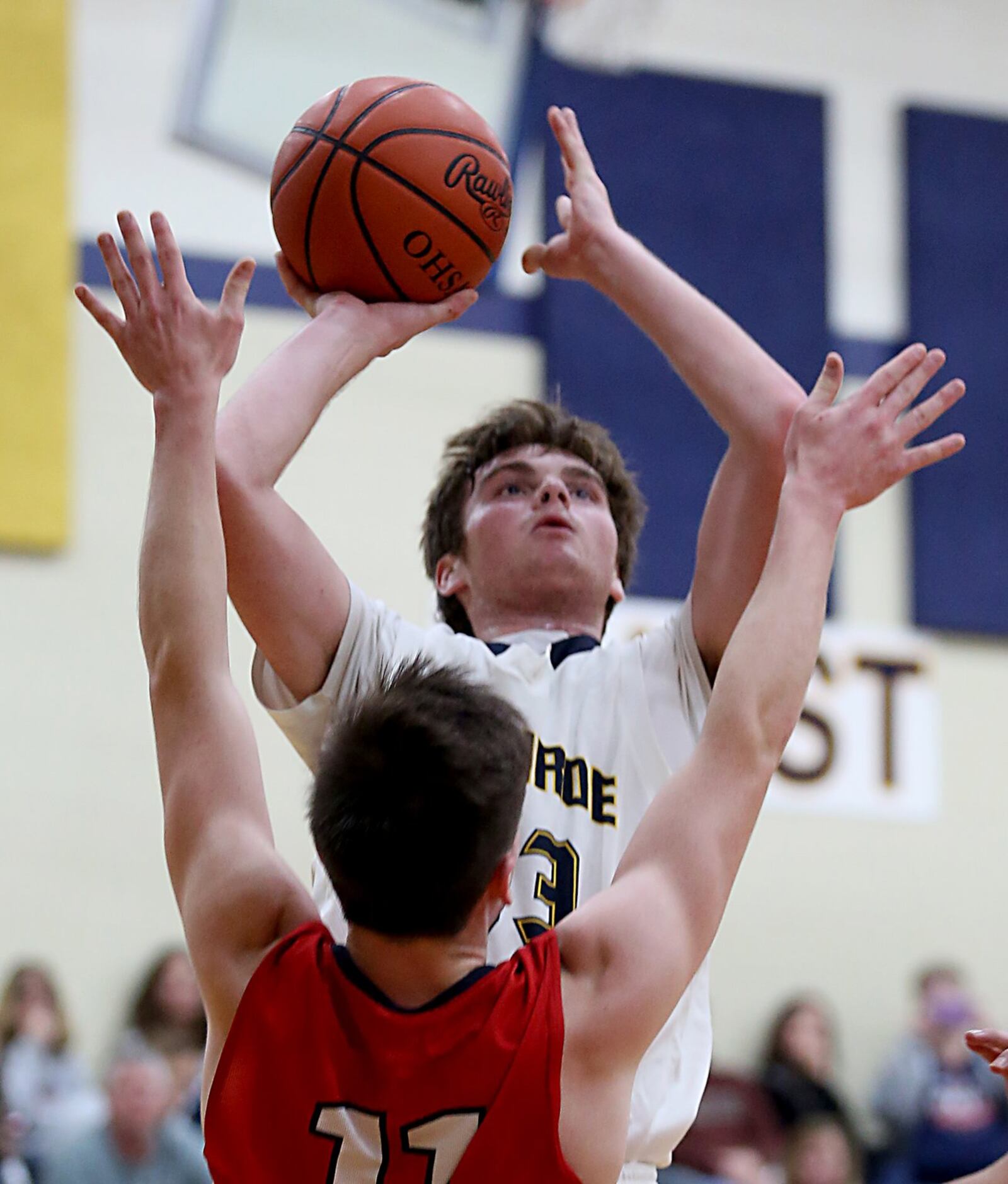 Monroe forward Chad Rolph shoots over Talawanda’s Justin Boggs during Tuesday night’s game at Monroe. CONTRIBUTED PHOTO BY E.L. HUBBARD