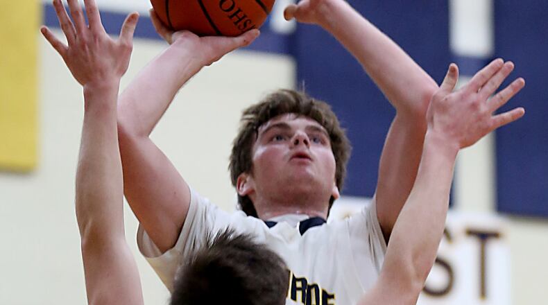 Monroe forward Chad Rolph shoots over Talawanda’s Justin Boggs during Tuesday night’s game at Monroe. CONTRIBUTED PHOTO BY E.L. HUBBARD