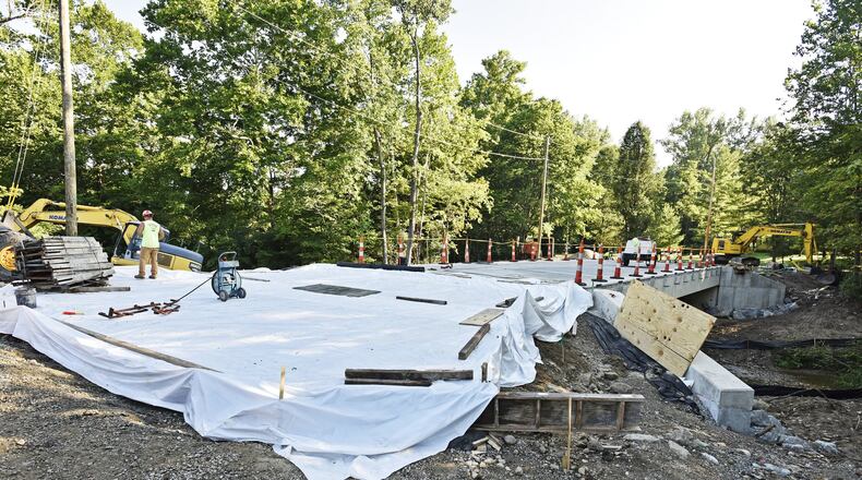 Construction continues on the bridge replacement on Myers Road in Madison Township Wednesday, July 25. Butler County Engineer Greg Wilkens says all of their major road projects are nearly complete, on time and on budget. NICK GRAHAM/STAFF