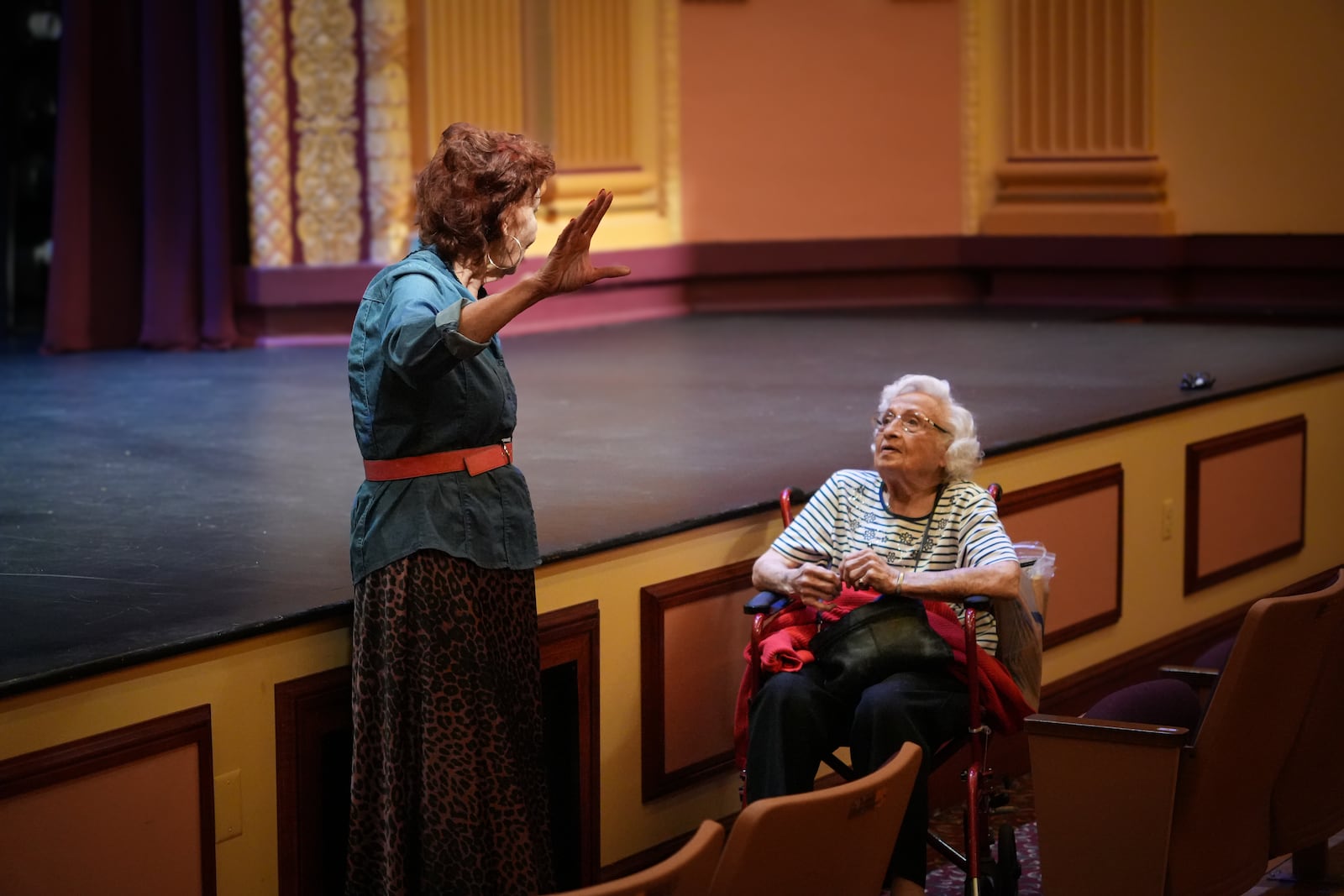 Chris Kingston (left) gives Lois Hicks a tour of Stivers. Lois remembered the auditorium.
JEFF CROWELL/CONTRIBUTED