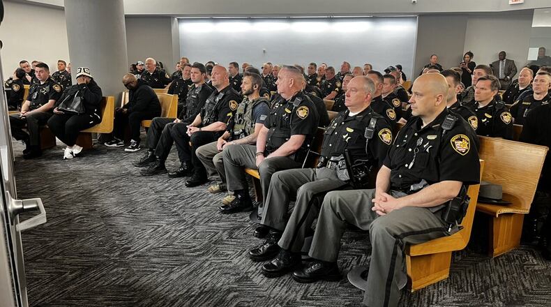 Officers and friends and family attend Rodney Hinton Jr.'s bond hearing. WCPO/CONTRIBUTED