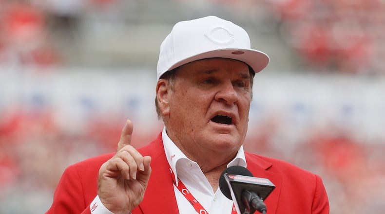FILE -  Pete Rose speaks during a statue-dedication ceremony before a baseball game between the Cincinnati Reds and the Los Angeles Dodgers, June 17, 2017, in Cincinnati.   (AP Photo/John Minchillo, File)