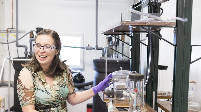 Jennifer Menzies, pictured in 2018 at her lab in Mason, is a P&G scientist that is part of a team that tests and assesses how activated sludge water at wastewater treatment plants reacts and interacts with chemicals and ingredients that may be included in P&G products. P&G has worked with Fairfield’s wastewater treatment plant for around 25 years. PROVIDED