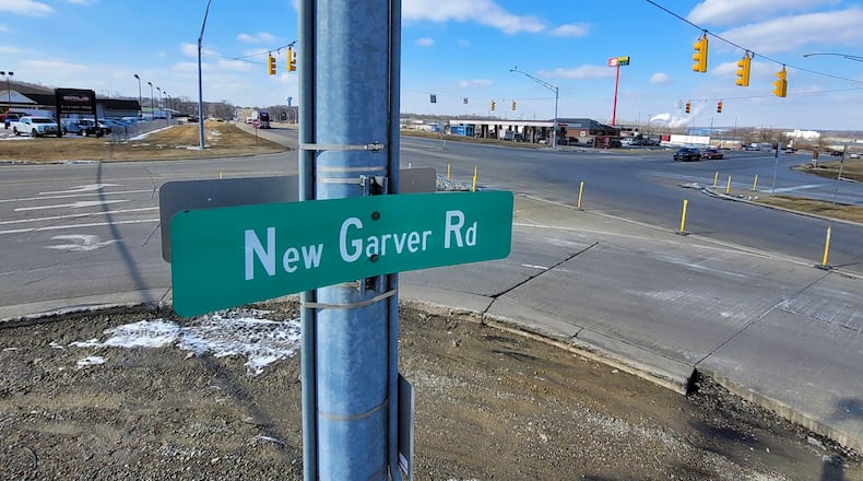 A man was shot and killed by Monroe Police Officers in that area of New Garver Road Friday night. NICK GRAHAM/STAFF