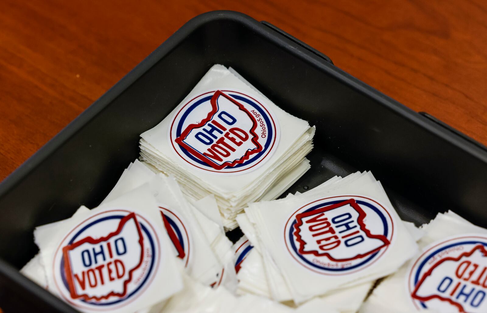 Stickers are ready to be handed out to early voters Monday, Nov. 1, 2021, at the Butler County Board of Elections in Hamilton. NICK GRAHAM/STAFF