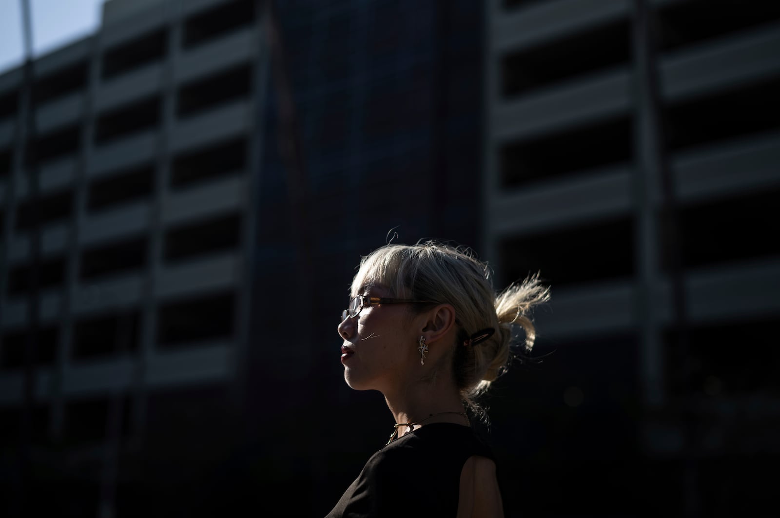 Maria Do, community mobilization manager at the Los Angeles LGBT Center, stands for a photo outside Children's Hospital Los Angeles before a protest against the closure of the hospital's trans youth clinic Thursday, July 3, 2025, in Los Angeles. (AP Photo/Jae C. Hong)