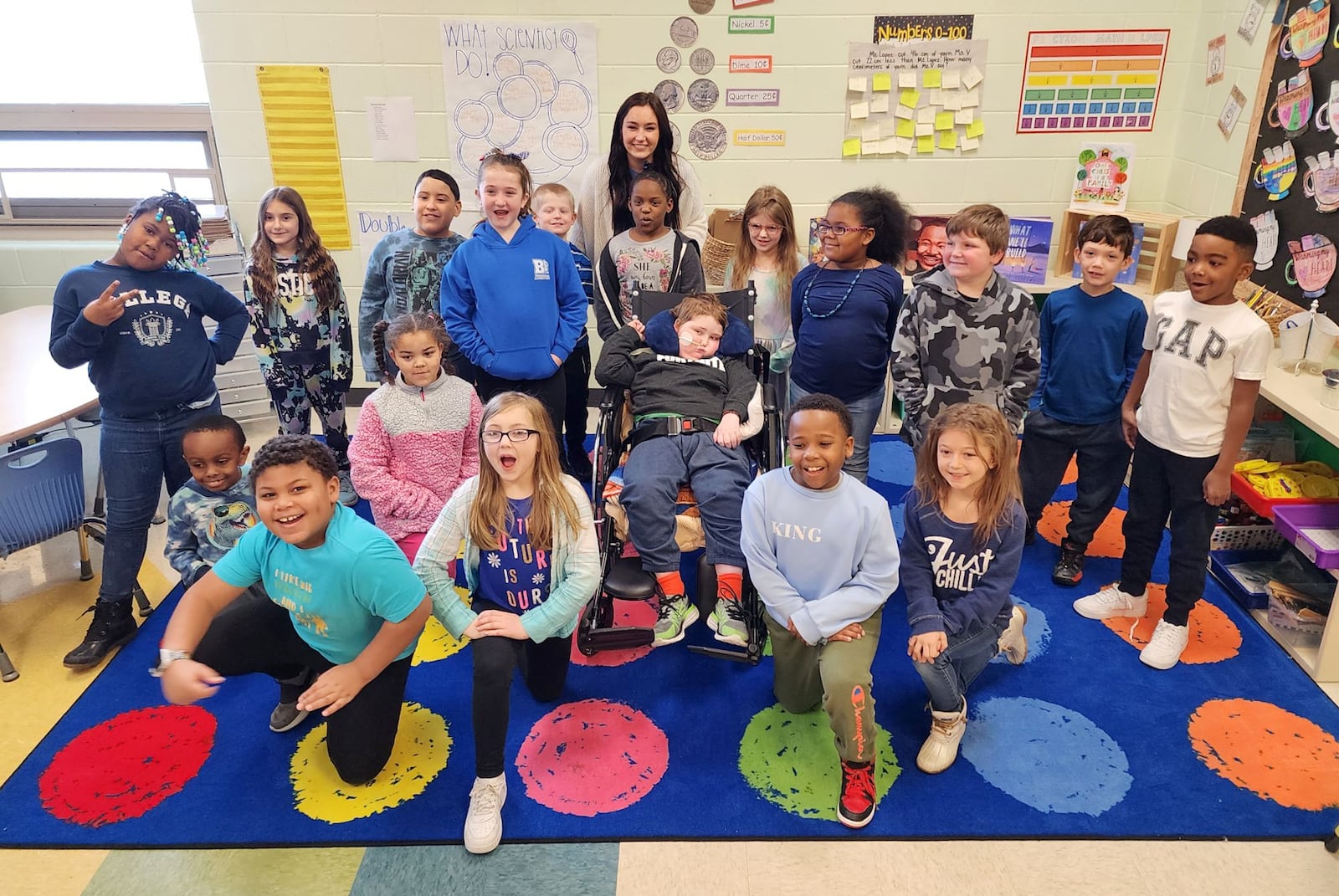 Rydder Ames, a 7-year-old battling a rare brain disease called DMG, visited his second-grade classroom at Brookwood Elementary Tuesday, Jan. 24, 2023 to receive handmade birthday cards from his classmates and listen to a story read by his teacher Piper Van Der Veer. NICK GRAHAM/STAFF