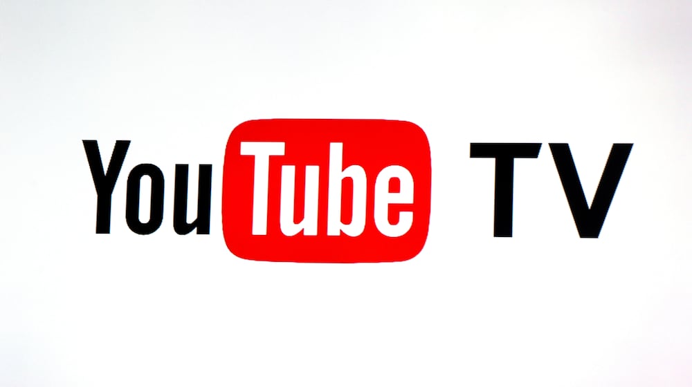 FILE - This Tuesday, Feb. 28, 2017, file photo shows the YouTube TV logo at the YouTube Space LA in Los Angeles. T (AP Photo/Reed Saxon, File)