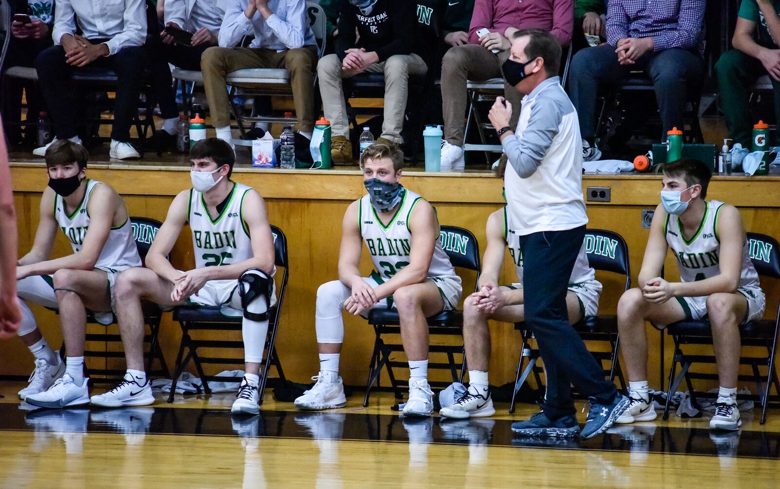 Badin players on the bench are masked up during their game against Fenwick Friday, Dec. 11, 2020 at Badin High School in Hamilton. Badin won 55-45. NICK GRAHAM / STAFF