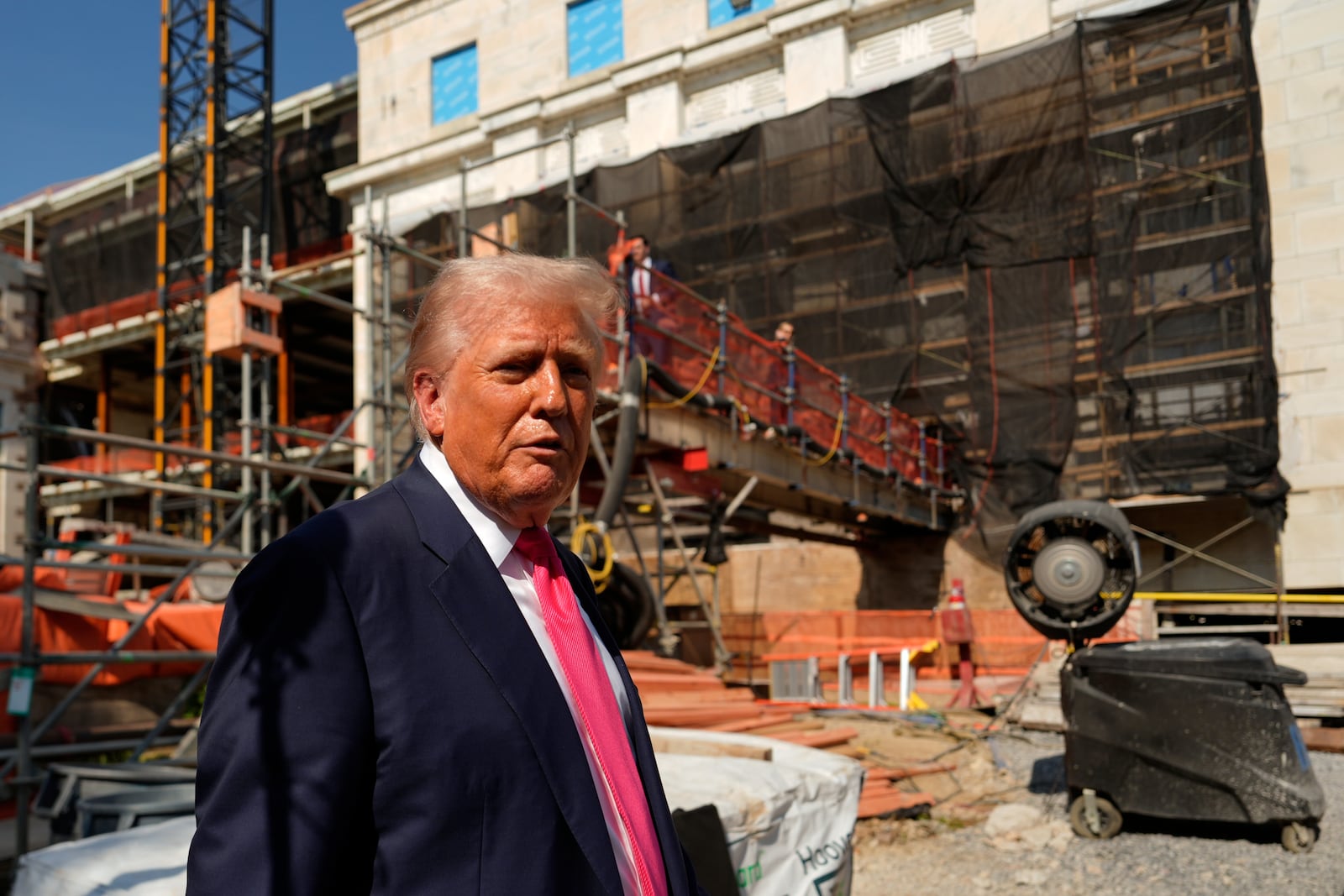 President Donald Trump departs following a visit to the Federal Reserve, Thursday, July 24, 2025, in Washington. (AP Photo/Julia Demaree Nikhinson)