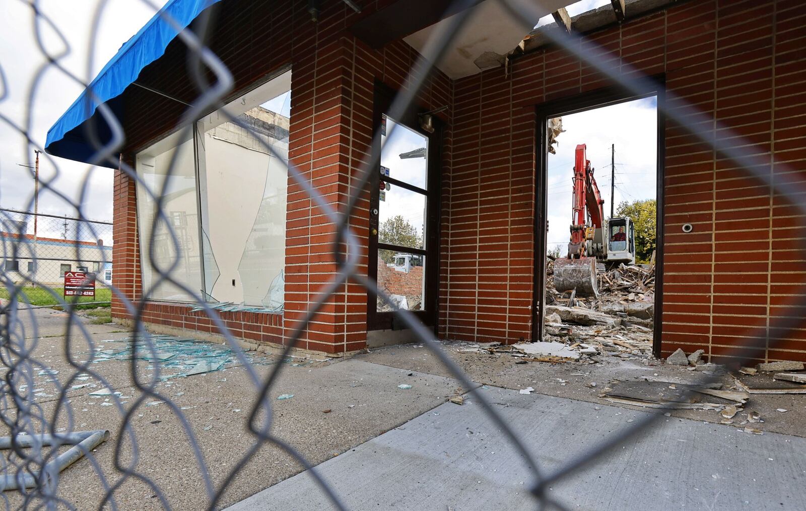 Demolition is happening this week to make progress toward the Rossville Flats complex in Hamilton. It will include about 75 to 80 apartments in the 300 block of Main Street. Frost Factory, which has been a hit at Liberty Center with real-fruit slushies for adults and kids, including alcohol for the adults, signed a lease to open a second location next year on the street level of the complex. Officials say it is the first new construction of apartments in the commercial stretch of Main Street near the Great Miami River in about a century. NICK GRAHAM / STAFF