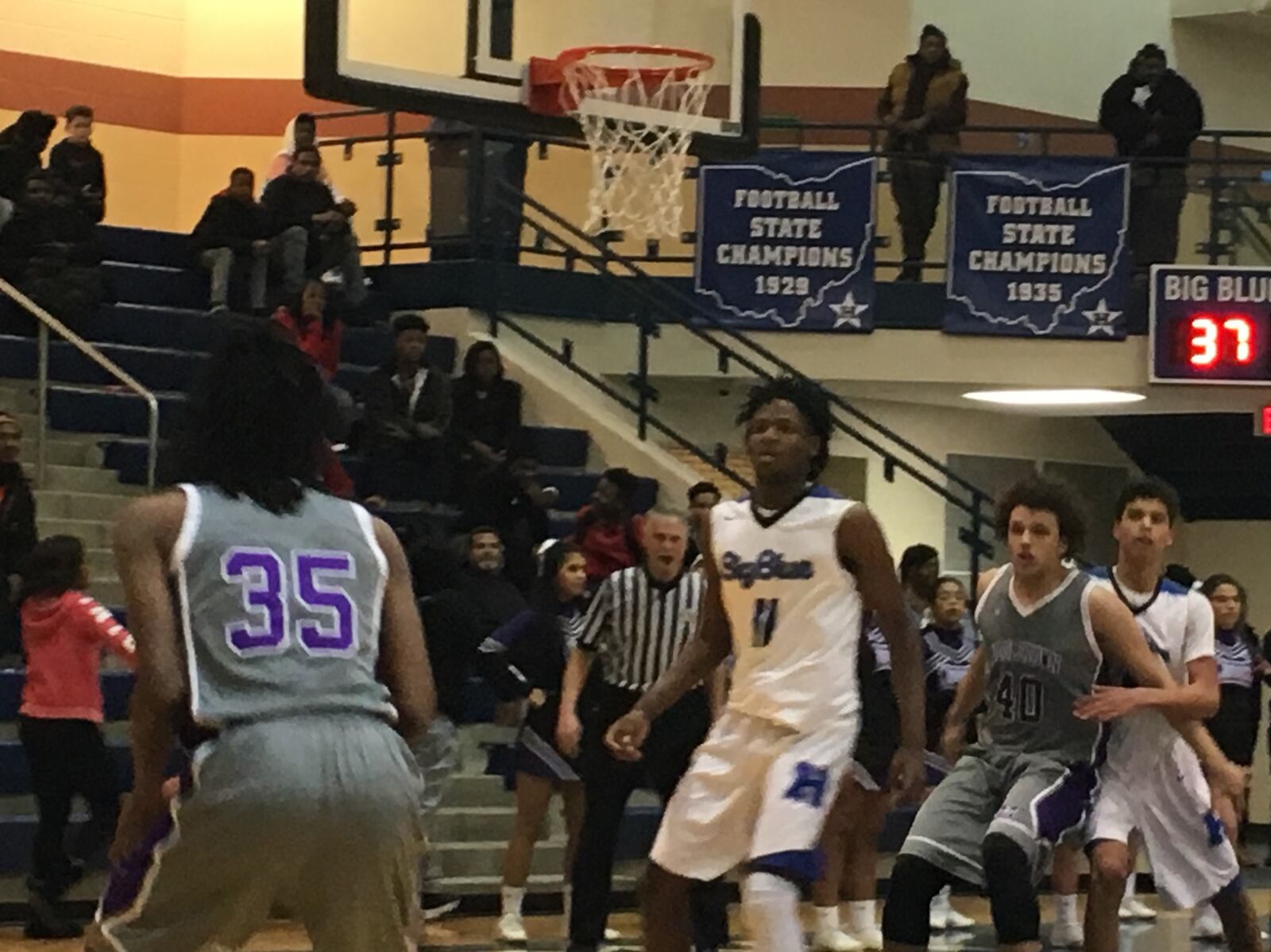 Middletown’s Broderick McGhee (35) is about to put up a shot as Hamilton’s Bryan Henderson (11) and Trey Robinson watch, along with the Middies’ Chris Stallworth (40), during Wednesday night’s game at the Hamilton Athletic Center. RICK CASSANO/STAFF