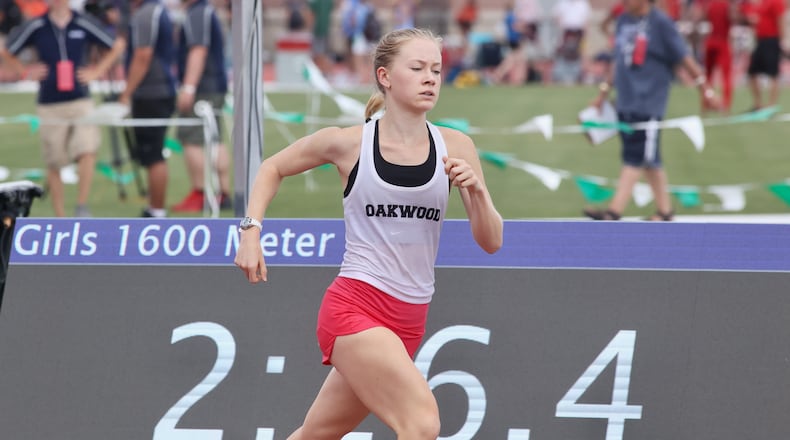 Oakwood's Bella Butler races to victory in the 1,600-meter race at the Division II state track meet on Saturday, June 3, 2023, at Jesse Owens Memorial Stadium in Columbus, Ohio. David Jablonski/Staff