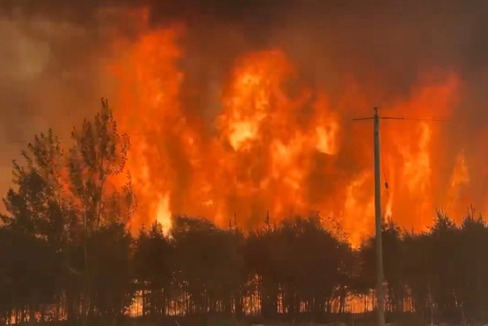 This photo provided by the Manitoba government shows wildfires in Wanless, Manitoba, Canada on Thursday, May 29, 2025. (Manitoba government via AP)