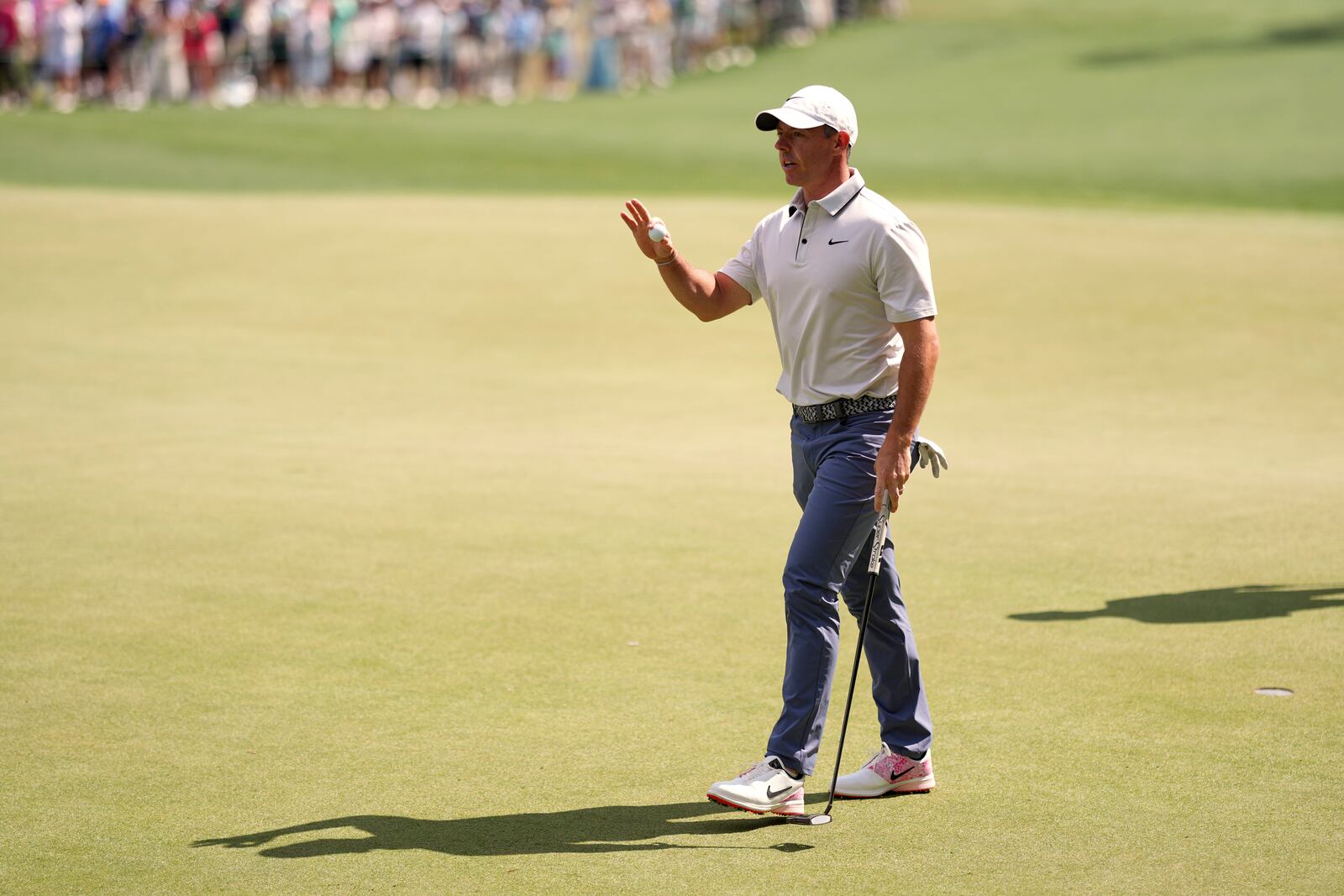 Rory McIlroy, of Northern Ireland, waves after making a putt on the sixth hole during the third round at the Masters golf tournament, Saturday, April 12, 2025, in Augusta, Ga. (AP Photo/Matt Slocum)