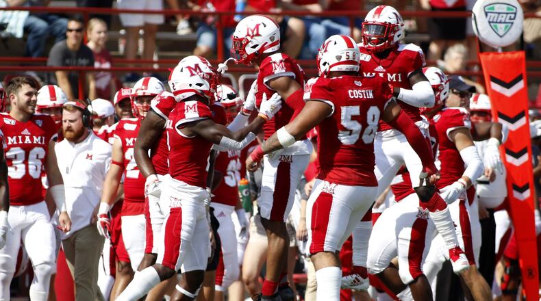 OXFORD, OHIO - SEPTEMBER 28: Mike Brown #3 and the Miami of Ohio RedHawks celebrate after an interception in the game against the Buffalo Bulls at Yager Stadium on September 28, 2019 in Oxford, Ohio. (Photo by Justin Casterline/Getty Images)