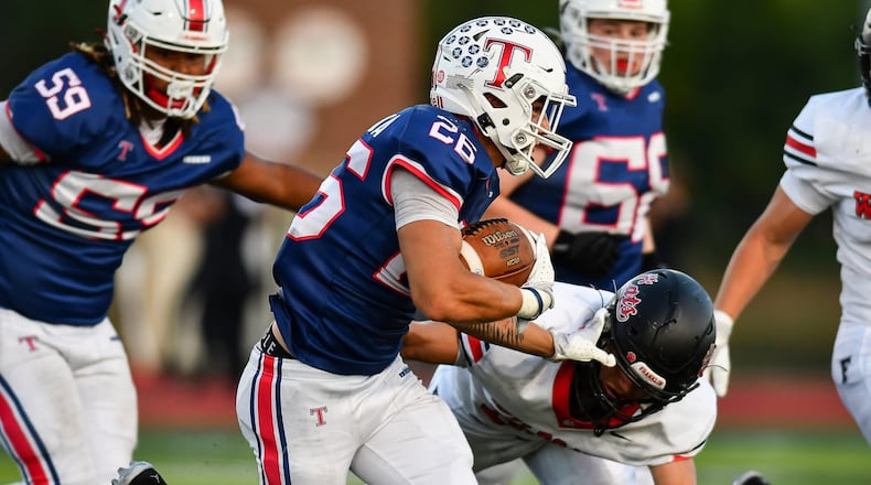 Talawanda running back Lance Cantrell rushes with the football against Franklin earlier this season. KYLE HENDRIX / CONTRIBUTED