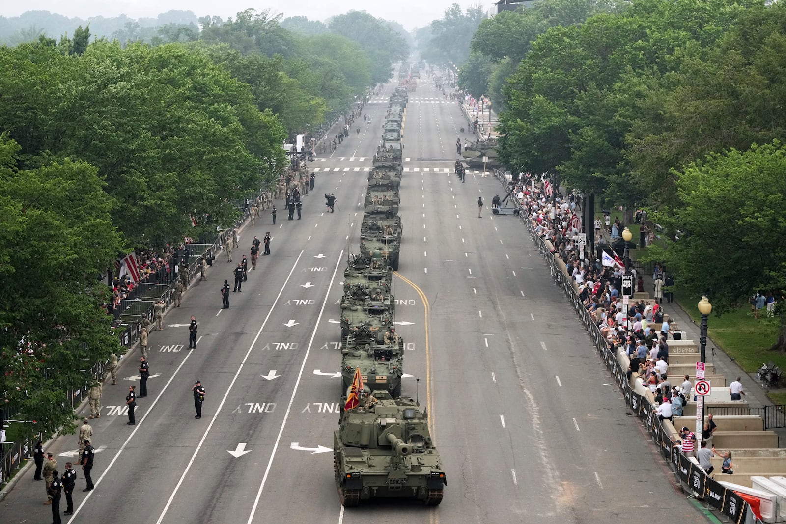 A military parade commemorating the Army's 250th anniversary and coinciding with President Donald Trump's 79th birthday, Saturday, June 14, 2025, in Washington. (AP Photo/Jacquelyn Martin)