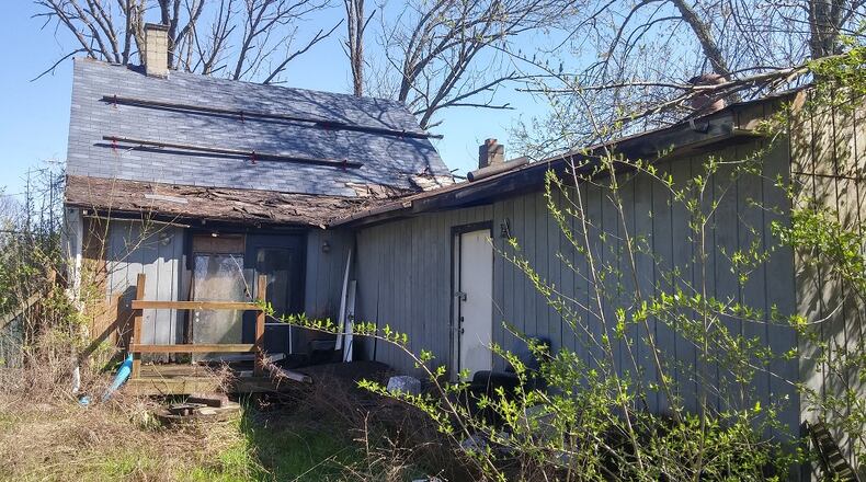 The Butler County land bank has approved funding a new demolition — this home in Madison Twp. that used to be the place where a man would wrestle his bear in the fenced-in yard. CONTRIBUTED