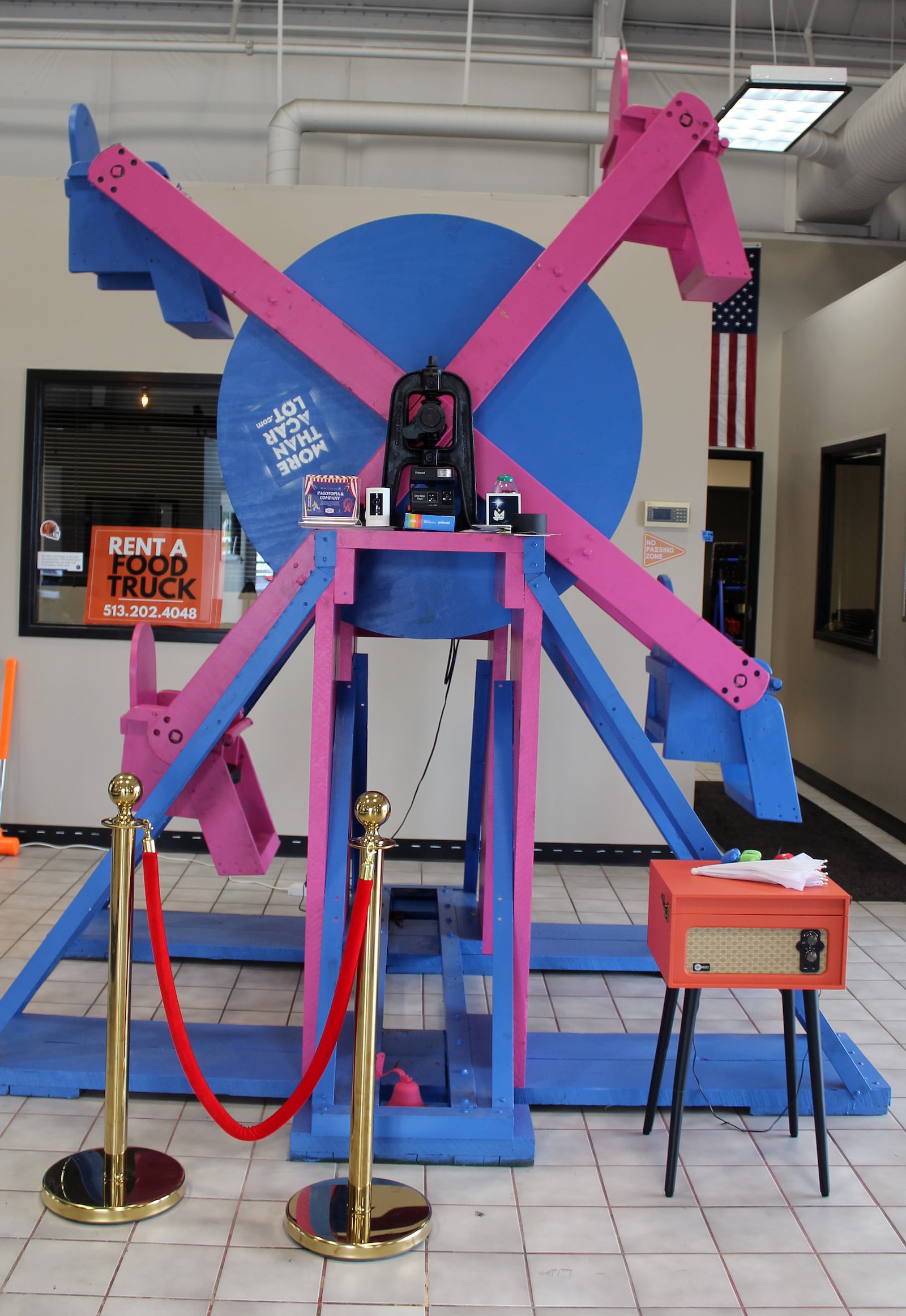Used car dealership, Pagotopia & Company has a ferris wheel, perfect for dolls or stuffed animals set up in its lobby to entertain children while their parents conduct business. SUE KIESEWETTER/CONTRIBUTED