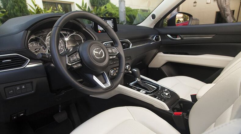 All models come standard with the SKYACTIV-G 2.5 engine and six-speed SKYACTIV-DRIVE automatic transmission. Front-wheel drive is standard, with Mazda s predictive i-ACTIV all-wheel drive available on all trim levels. Mazda photo