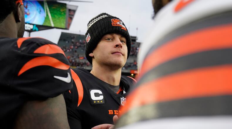 Cincinnati Bengals quarterback Joe Burrow greets the Cleveland Browns following an NFL football game, Sunday, Dec. 11, 2022, in Cincinnati. (AP Photo/Jeff Dean)