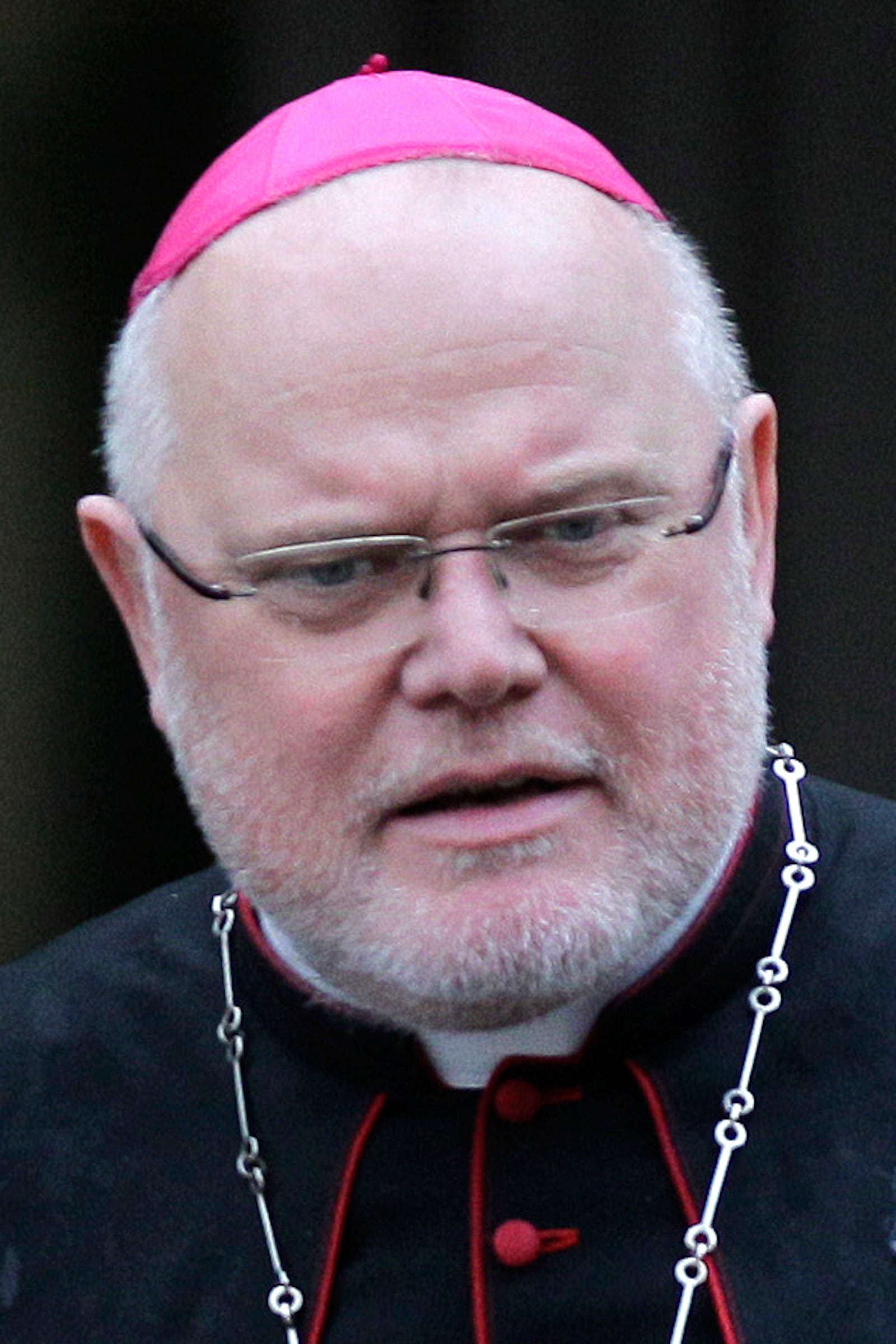 FILE - Munich Archbishop and Freising Reinhard Marx is seen prior to a meeting of cardinals for a day of reflection at the Vatican, Nov. 19, 2010. (AP Photo/Alessandra Tarantino, File)