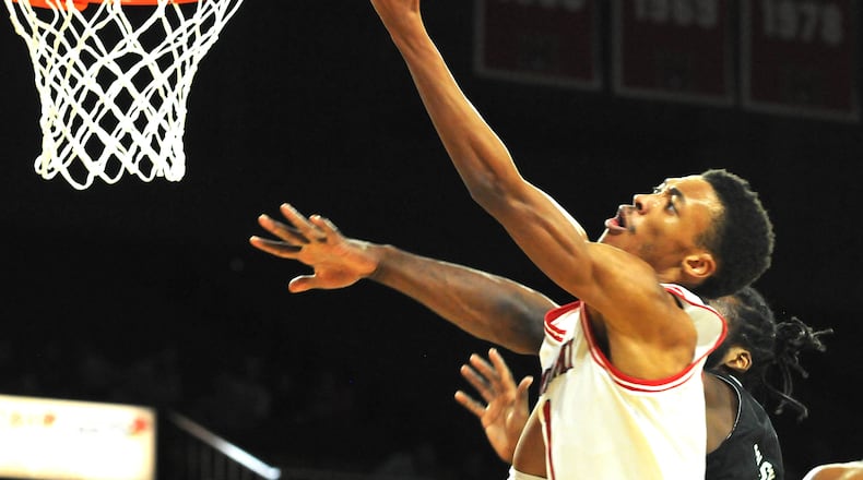 Miami's Kamari Williams, 1, goes up for two during the first half of a Mid American Conference game against Eastern Michigan at Millett Hall on Saturday, Jan. 28. DAVID A. MOODIE/CONTRIBUTING PHOTOGRAPHER