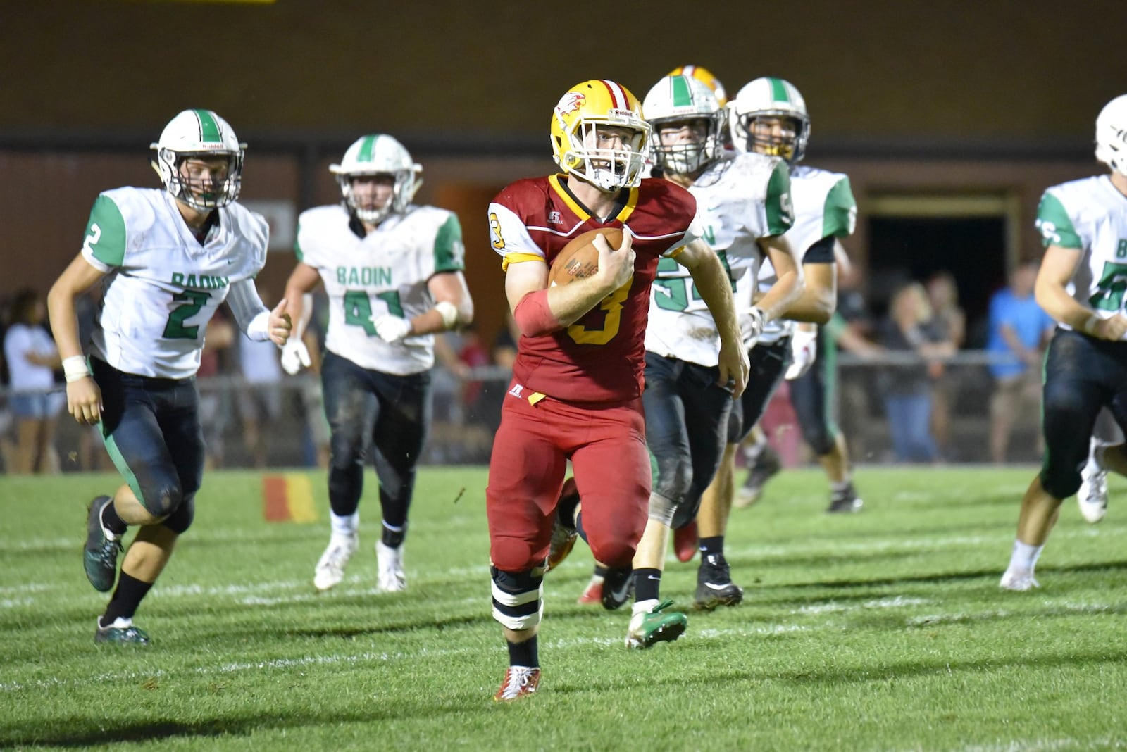Fenwick’s Jack Fessler finds some running room against the Badin defense during Friday night’s 21-9 FHS victory at Krusling Field in Middletown. CONTRIBUTED PHOTO BY ANGIE MOHRHAUS