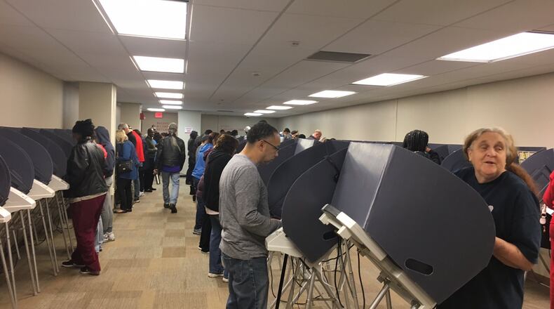 Early voters cast their ballots in the 10th District congressional race and others at the Montgomery County Board of Elections in 2016. LYNN HULSEY/staff writer