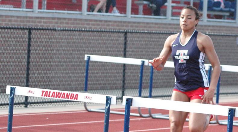 Talawanda’s Kyra Koontz, shown winning the 100-meter hurdles April 16 in the Dale Plank Invitational in Oxford, has qualified for the Division I state track & field tournament in that event. RICK CASSANO/STAFF