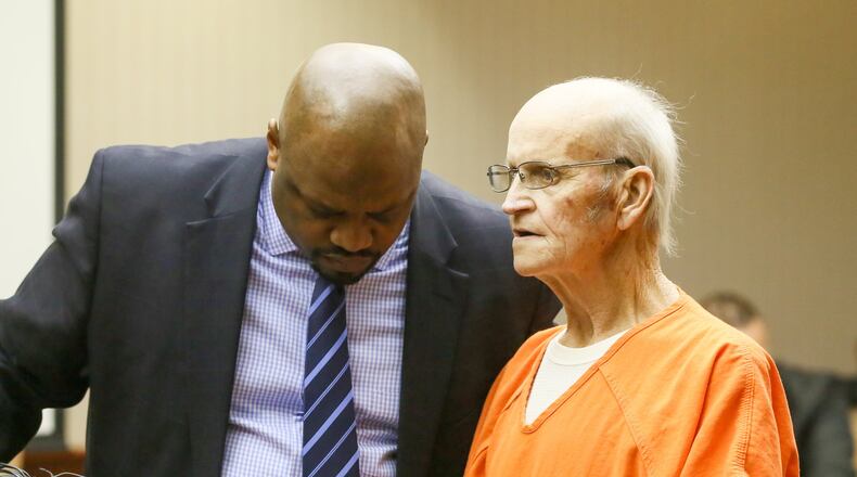 Lester Parker, with his attorney David Washington, has pleaded not guilty in the death of Hamilton firefighter Patrick Wolterman. Parker, 66, is the owner of the Pater Avenue home where Wolterman died last December in an arson. He is charged with murder and aggravated arson. GREG LYNCH / STAFF