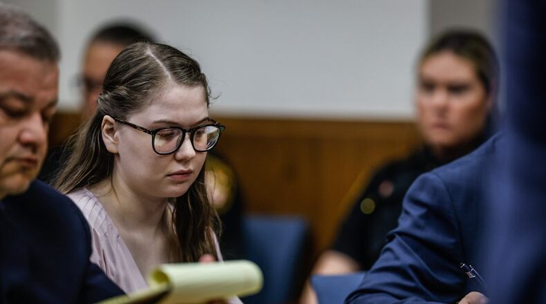 Abby Michaels, center, and her defense attorney, Jay Adams, left, at the beginning of Michaels' trial in Montgomery County Common Pleas Court on Monday, June 5, 2023. JIM NOELKER/STAFF