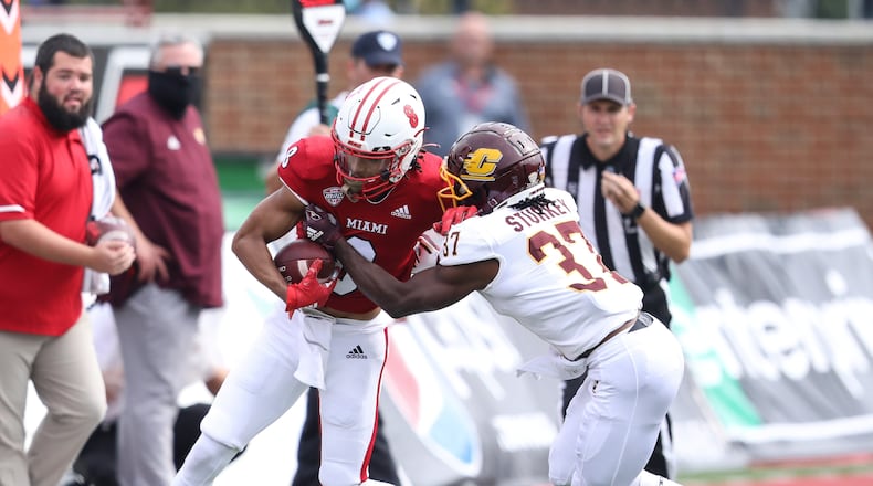Miami wide receiver Mac Hippenhammer tries to break free from a Central Michigan's Rolliann Sturkey during a game at Yager Stadium on Oct. 2, 2021. Miami University Athletics photo