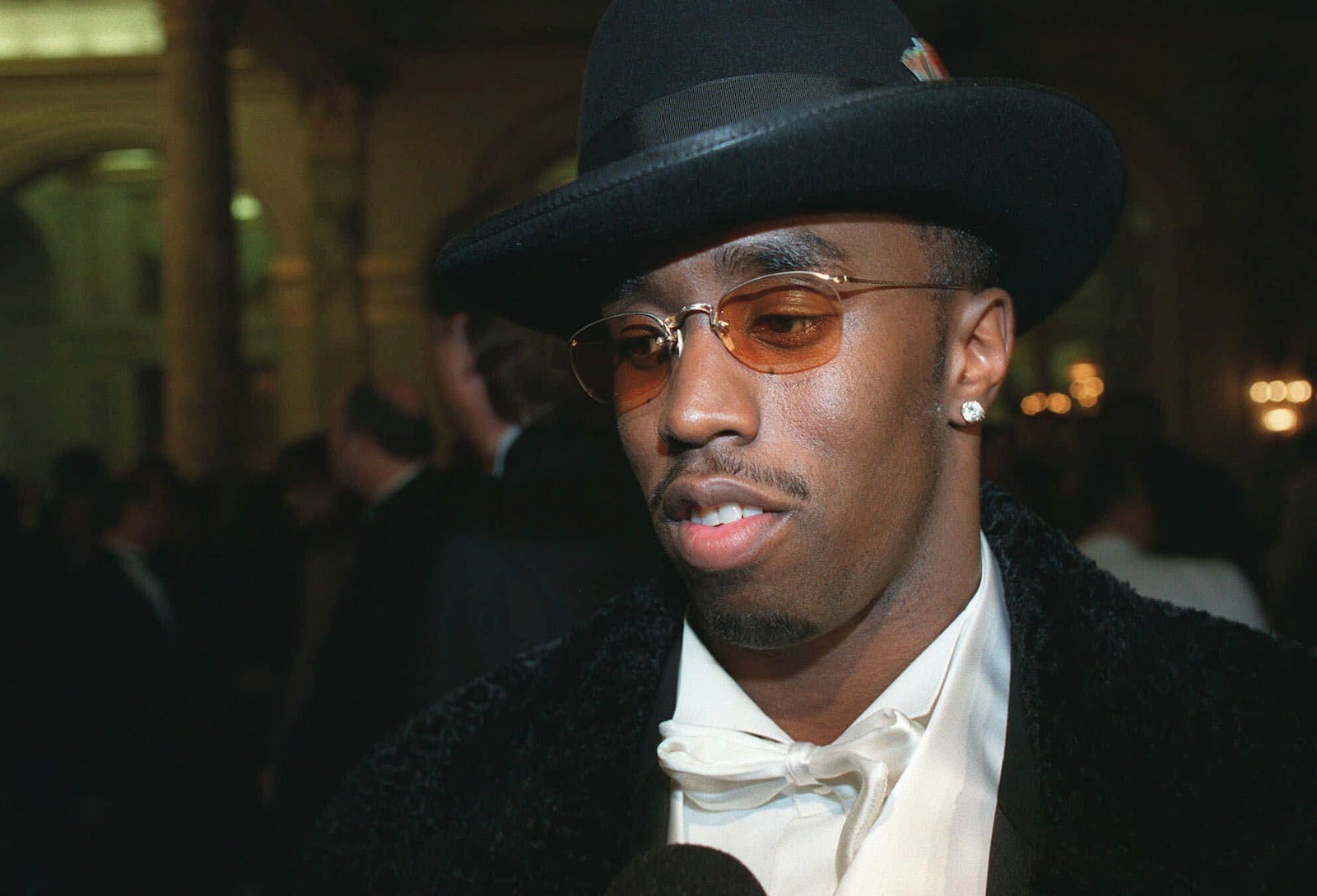 FILE - Nominated for four Grammy Awards, Sean "Puffy" Combs appears at Arista Records' pre-Grammy party in New York on Feb. 24, 1998, in New York. (AP Photo/Stuart Ramson)