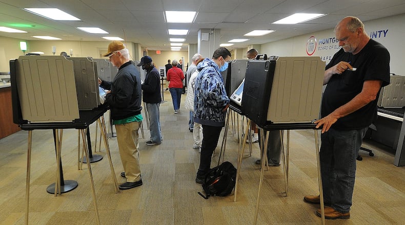 Voters at the Montgomery County Board of Elections Wednesday Oct. 12, 2022. Early voting started Wednesday in Ohio. Election officials expect a large turnout of early voters this year. MARSHALL GORBY\STAFF
