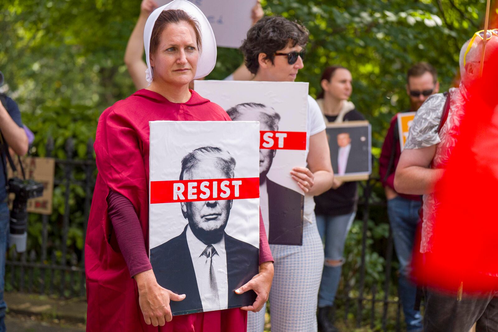 People take part in a Stop Trump Scotland protest outside the US Consulate in Edinburgh, as US President Donald Trump begins his five-day private trip to the country at his Turnberry golf course in South Ayrshire on Saturday July 26, 2025. (Jane Barlow /PA via AP)