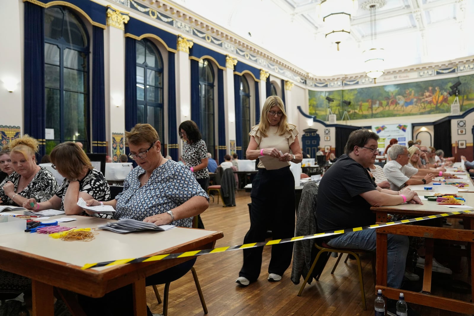 Votes are counted at Grimsby Town Hall, in Lincolnshire, England, for the Greater Lincolnshire Mayor election, Thursday, May 1, 2025. (Joe Giddens/PA via AP)